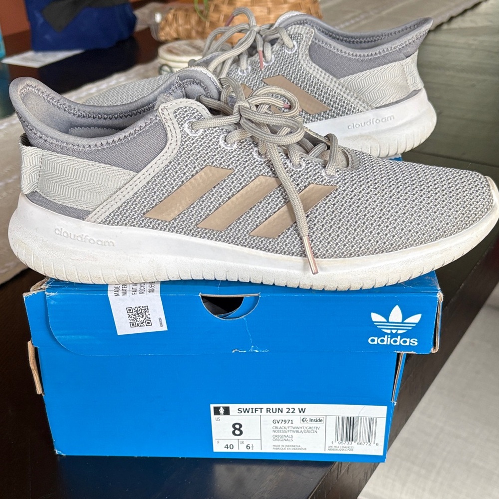 adidas women’s Swift Run 22 Lightweight Sneakers in Light Gray with Tan Stripes
